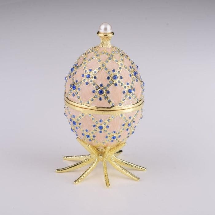 Pink Faberge Inspired Egg with Clock Inside: Pink Faberge Inspired Egg with Clock Inside Enamel Painted Trinket Box Decorated with Austrian Crystals. Plated with 24K Gold. Each crystal is handpicked and artistically placed on each piece. The tri