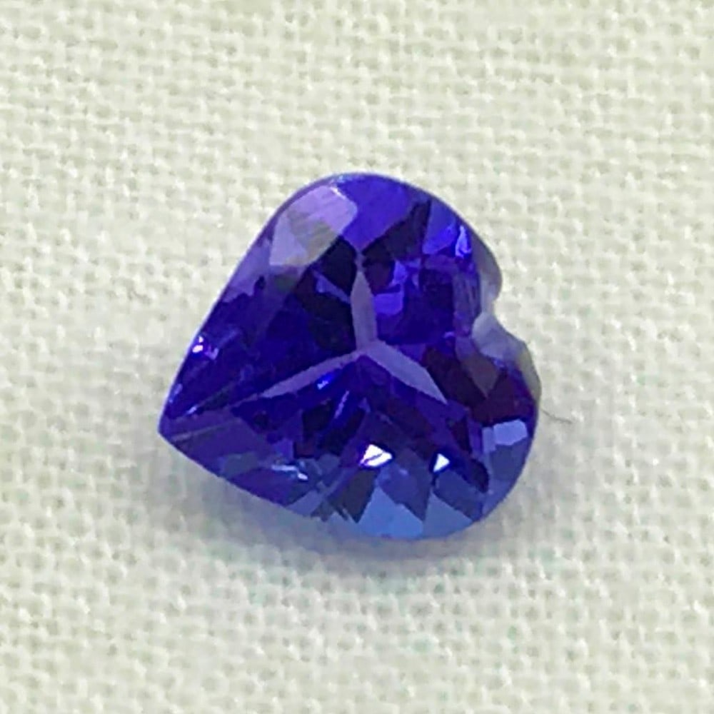 .86ct Tanzanite Heart of Love Faceted Gemstone: .86ct Tanzanite Heart of Love Faceted Gemstone Tanzanite beautiful gemstone heart shaped , Size- 6 mm, Weight- 0.86 ct View photo for further details.