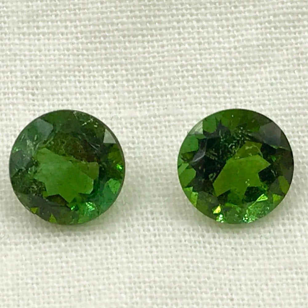 2.65ct Green Tourmaline Round Faceted Pair Gemstones: Green Tourmaline Round Faceted Pair Majestic Green Tourmaline, round pair for earrings, Size- 7 mm, Weight- 2.65 ct View photos for further details.