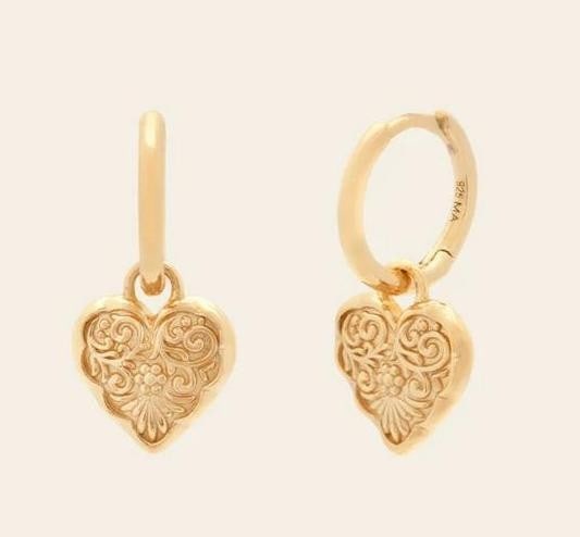 Ornate Heart Huggies - Gold Vermeil: Ornate Heart Huggies - Gold Vermeil For the love of all things vintage, these huggies feature ornate heart-shaped charms that blend classic motifs with a nostalgic, swoon-worthy design. Crafted in