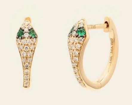 Serpent Diamond Huggie Earrings: Serpent Diamond Huggie Earrings A pair of serpent-shaped huggie earrings defined by fluid curves and precise stone setting. Each earring features emerald-set eyes and a body accented with pave