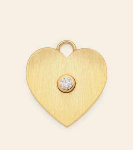 Single Stone Heart Charm - Gold Vermeil: Single Stone Heart Charm - Gold Vermeil A little glow goes a long way. The Single Stone Heart Charm features a brushed gold finish accented with a single sparkling CZ stone, bringing a touch of quiet