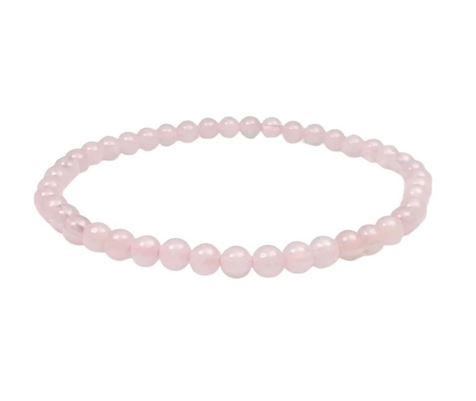 4mm Bead Rose Quartz Bracelet: 4mm Bead Rose Quartz Bracelet Rose quartz is a pink colored semi-precious gemstone. The pink color is caused by traces of manganese or titanium and will range from a light to dark pink color. Its heal