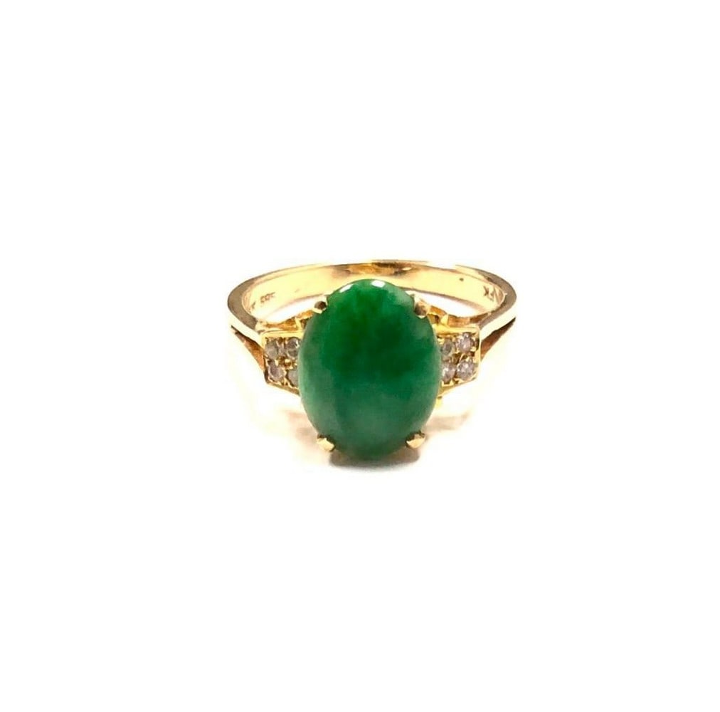 Ladies .87ct Jade & Diamond Stone Ring With 14K 585 Stamped Band: Ladies .87ct Jade & Diamond Stone Ring With 14K 585 Stamped Band. The ring is partnered by 8 round cut .01ct round cut diamonds. View Photos For More Details