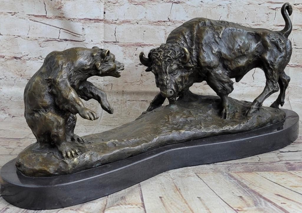 A Wild Encounter Battle of a Bear and Bison Bronze Sculpture - 9'' x 21'': A Wild Encounter Battle of a Bear and Bison Bronze Sculpture - 9" x 21" The American bison, often referred to as a buffalo, confronts the bear in a face-to-face standoff, their expressions etche