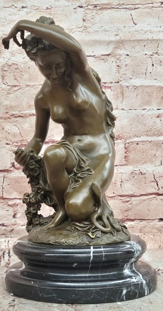 Jean Patoue Original Nude Woman Holding Rose Bronze Sculpture - 11'' x 6'': Jean Patoue Original Nude Woman Holding Rose Bronze Sculpture - 11" x 6" This original bronze sculpture depicts a nude woman in a serene, natural pose, gently holding a rose. The figure emphasiz
