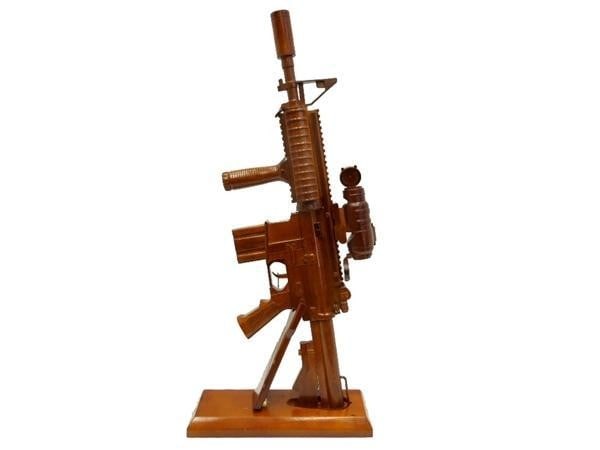 Wooden M-4 Carbine Gun Replica: Wooden M-4 Carbine Gun Replica If youre looking for that very special gift or award, then this is it.Handcrafted from solid mahogany and given three coats of polyurethane to give it a durable high