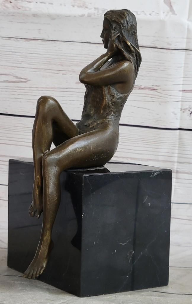 Nude Woman Bronze Sculpture: Nude Woman Bronze Sculpture Sexy, proud and confident, this beauty bares it all. She is no waif by any means, with round hips, curvy thighs and full breast, she is an ode to the pinups of the 40` s