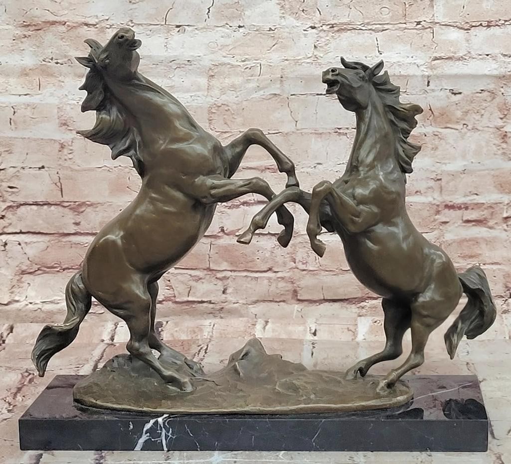 Miguel Lopez (Milo) Original Fighting Stallions Bronze Sculpture on Marble Base - 14'' x 17'': Miguel Lopez (Milo) Original Fighting Stallions Bronze Sculpture on Marble Base - 14" x 17" This bronze sculpture depicts two stallions in combat, rendered with attention to proportion, musculat