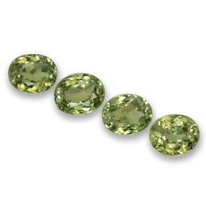 1ct Oval Cut Demantoid Garnets: 1ct Oval Cut Demantoid Garnets This lot contains 4 oval cut Demantoid Garnets, each at 0.42ct Raw Dimension: 5 x 4mm Total Carat Weight: 1.66ct Treated: No Please view photos for further details.