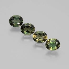 2ct Oval Cut Kornerupine Stones: 2ct Oval Cut Kornerupine Stones This lot contains 4 oval vut Kornerupine stones, each at 0.70ct Raw Dimension: 6 x 5 x 3mm Total Carat Weight: 2.70ct Treated: No Please view photos for further