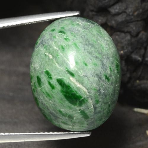 29.33ct Oval Green Maw-sit-sit: 29.33ct Oval Green Maw-sit-sit Maw-sit-sit brings back vitality and energy, it is also a sign of hope. This unique gemstone is similar to Jade and also contains jade properties. Dimensions 21.2 x 16.8