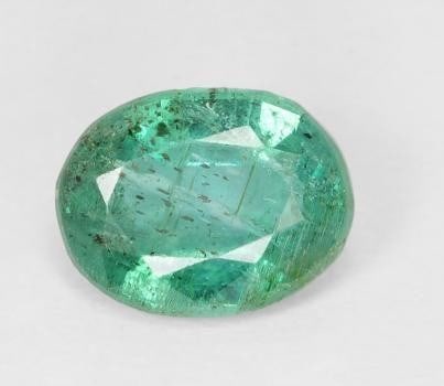 1.11 ct Oval Cut Faceted Jungle Green Emerald Gemstone: 1.11 ct Oval Cut Faceted Jungle Green Emerald Gemstone Immerse yourself in the lush elegance of the Oval Cut Faceted Jungle Green Emerald Gemstone, a captivating masterpiece that transports you to the