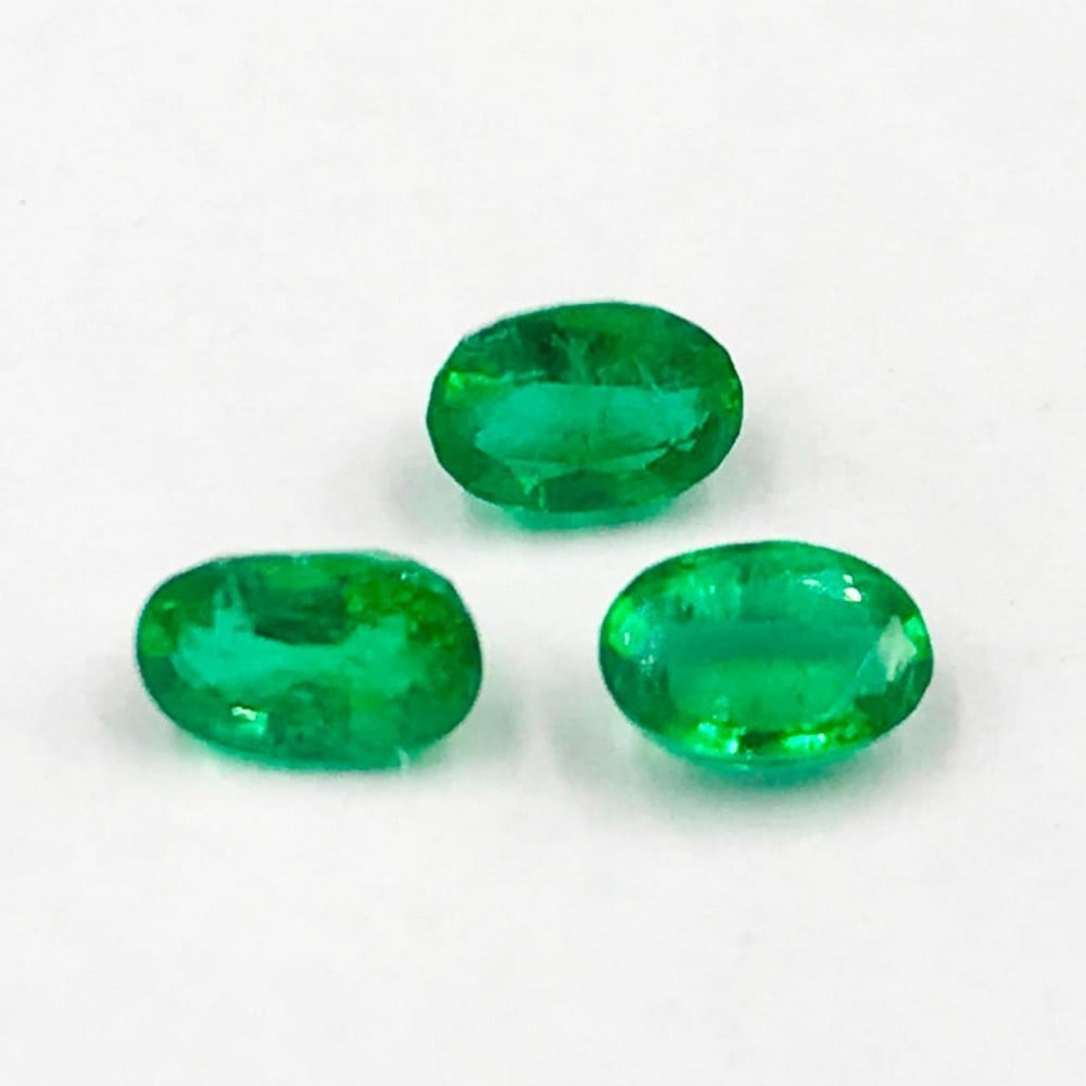0.84ct Three Oval Shaped Emeralds Gemstones (1 of 1)