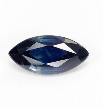 1.28 ct Marquise Cut Faceted Royal Navy Blue Sapphire Gemstone: 1.28 ct Marquise Cut Faceted Royal Navy Blue Sapphire Gemstone Embark on a journey of regal elegance with the Marquise Cut Faceted Royal Navy Blue Sapphire Gemstone, a true emblem of sophistication