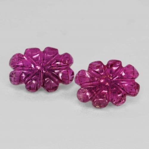 Flower Cut Red Rubellite Tourmalines - 2.57ct Total Weight: Flower Cut Red Rubellite Tourmalines - 2pc Matching Love and spirituality go hand-in-hand and Rubellite encourages compassion and gentleness. These matching flower cut gemstones would make for a