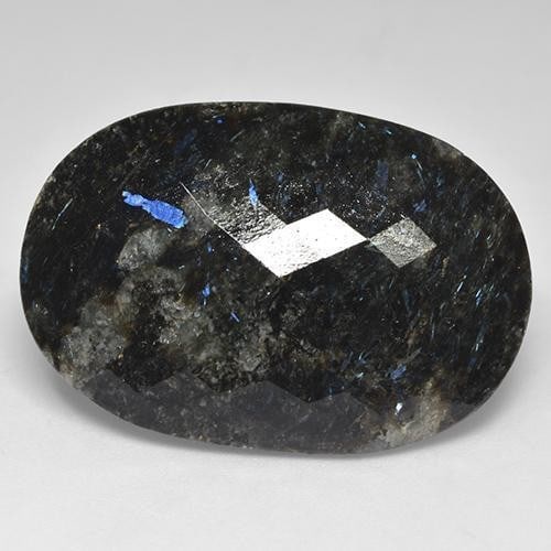 28.01ct Black Nuummite Checkerboard Gemstone: 28.01ct Black Nuummite Checkerboard Gemstone Nuummite is a stone of empowerment, allowing one to see beyond facades and to understand what lies beneath words and actions, ones own and that of others.