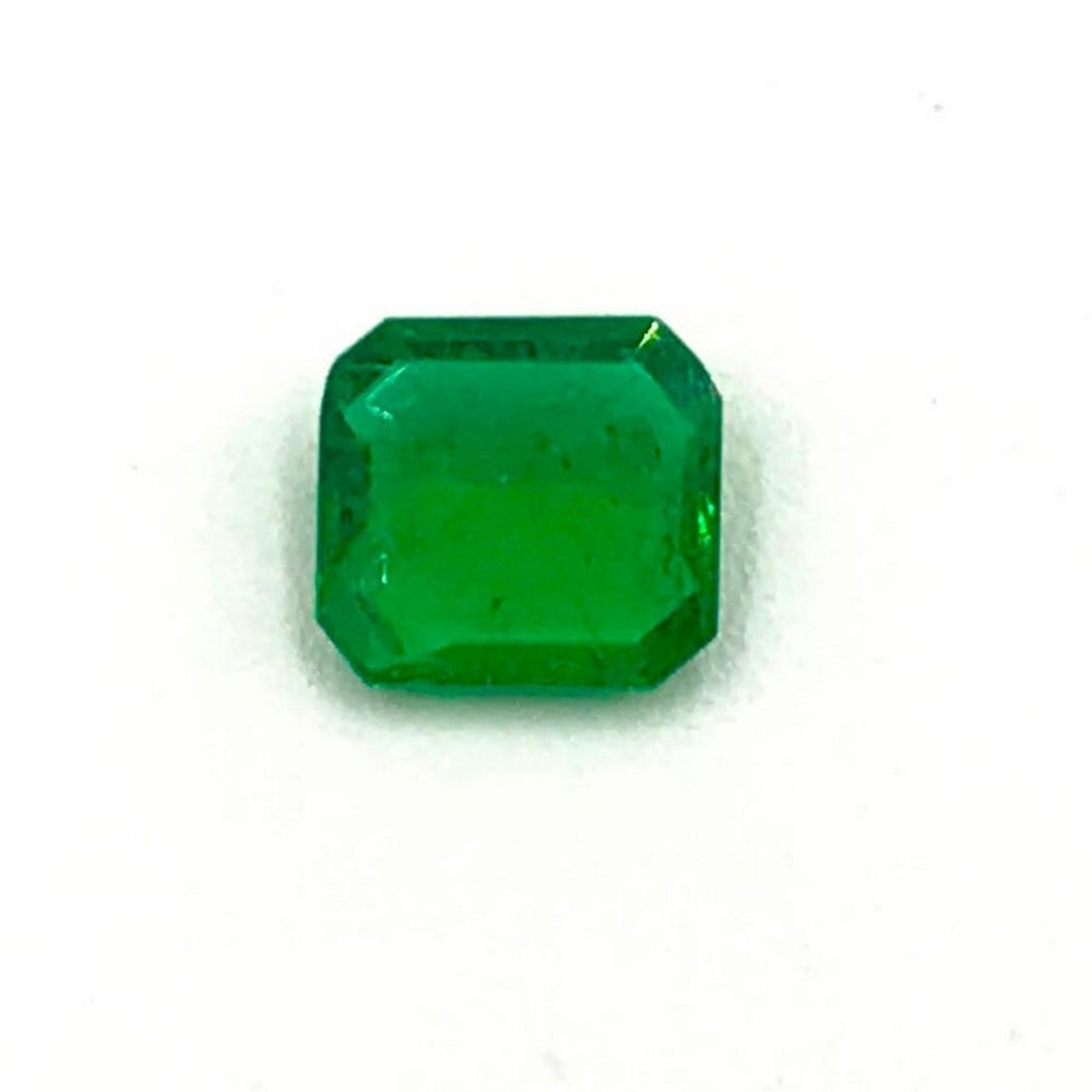 .82ct Emerald Octagon Faceted Gemstone: .82ct Emerald Octagon Faceted Gemstone Emerald zambian origin piece with lustre , Size- 6.9x6.4 mm, Weight- 0.82 ct View photos for further details.