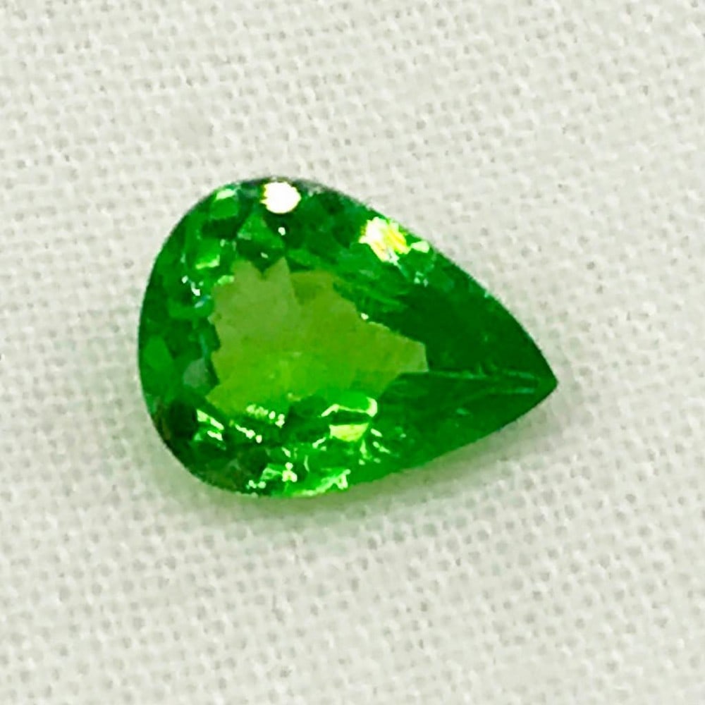 1.22ct Tsavorite Pear Faceted Gemstone: Tsavorite Pear Faceted Tsavorite pear flawless gemstone, Size- 8.2x6.2 mm, Weight- 1.22 ct View photos for further details.