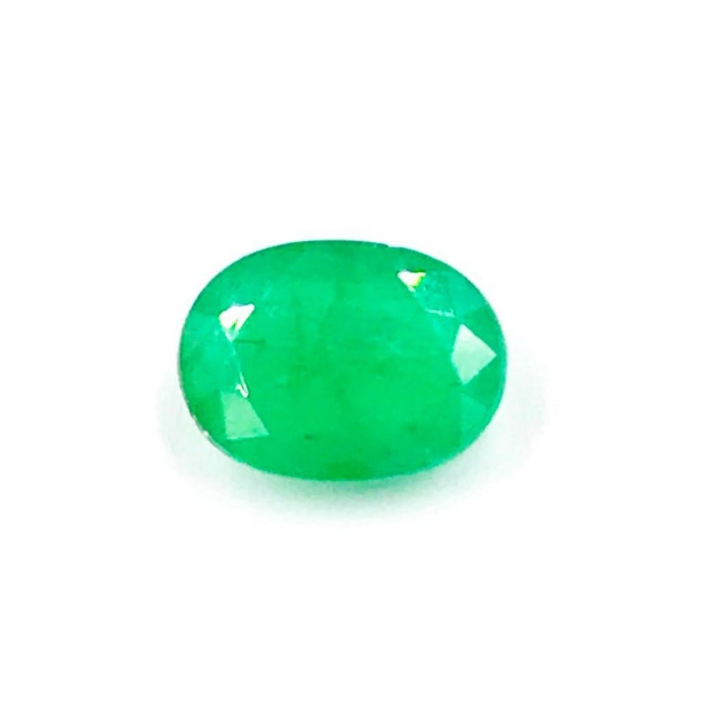 2.42ct Faceted Emerald Oval Gemstone: Faceted Emerald Oval For many, emerald is considered to be the symbol of rebirth. It is also believed to represent good fortune, youth, balance, growth, peace, and foresight. 9.8x7.2 mm, Weight- 2.42