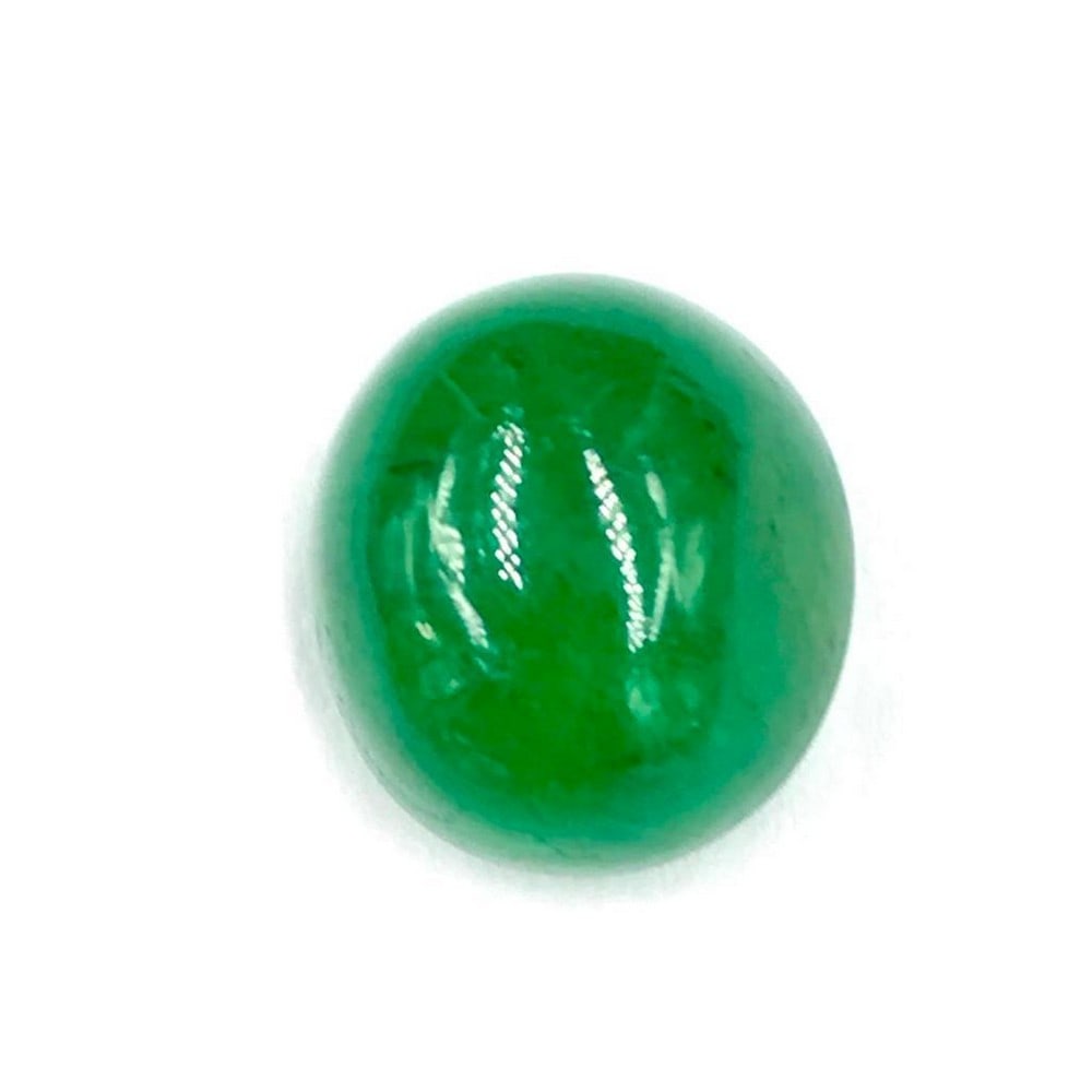 6.11ct Ethereal Emerald Oval Shaped Cabochon Gemstone: Ethereal Emerald Oval Shaped Cabochon For many, emerald is considered to be the symbol of rebirth. It is also believed to represent good fortune, youth, balance, growth, peace, and foresight. Size-