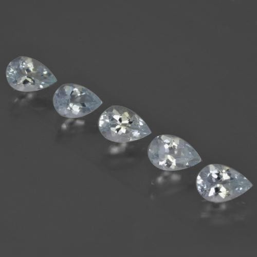 1.8ct Pear Cut Aquamarines: 1.8ct Pear Cut Aquamarine This lot contains 5 pear cut Aquamarines, each at 0.38ct Raw Dimension: 6 x 4mm Total Carat Weight: 1.88ct Treated: No Please view photos for further details.
