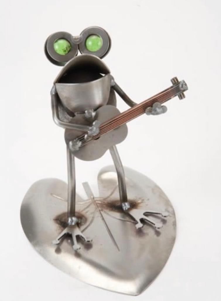 Frog Playing Guitar Metal Sculpture: Frog Playing Guitar Metal Sculpture These hand-crafted sculptures will rust to a beautiful, natural finish over time and look right at home indoors or outdoors in your yard or garden. Size: 7" L x