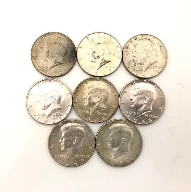 Three 1967, Three 1968 & Two 1969 United States Of America Half Dollar Coins: Three 1967, Three 1968 & Two 1969 United States Of America Half Dollar Coins. Obverse Profile of John Fitzgerald Kennedy facing left Lettering: LIBERTY GR IN GOD WE TRUST 1967, 1968 & 1969 Engraver: G