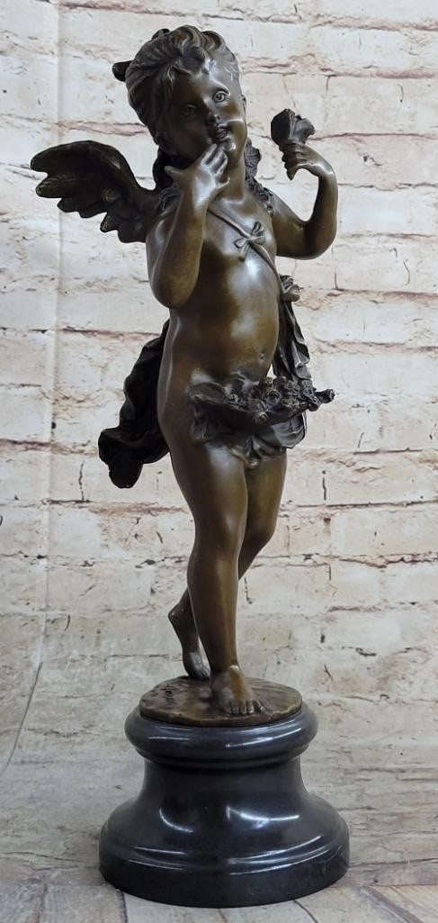 Bronze Sculpture of a Young Female Angel Cherub - 17'' x 7'': Bronze Sculpture of a Young Female Angel Cherub - 17" x 7" Enter a world of divine beauty with the " Cherubic Angel Among Ruins" bronze sculpture. This exquisite piece depicts an angel gra