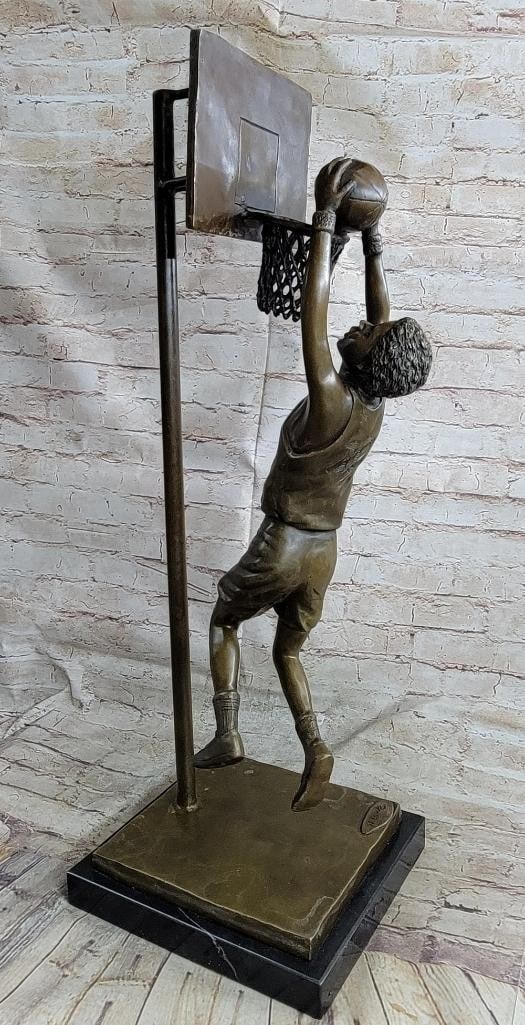 Basket Ball Player Slam Dunking Original Bronze Statue - 29'' x 10'': Basket Ball Player Slam Dunking Original Bronze Statue - 29" x 10" This bronze statue captures a basketball legend in mid-air, just moments before a powerful dunk. With the ball in his hands,