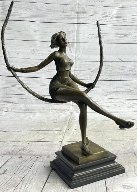Moonlit Elegance: Sexy Woman on Swing Bronze Sculpture: Moonlit Elegance: Sexy Woman on Swing Bronze Sculpture Boldly sensual and gracefully poised, this bronze sculpture features a captivating woman seated on an abstract swing crafted from a sweeping half