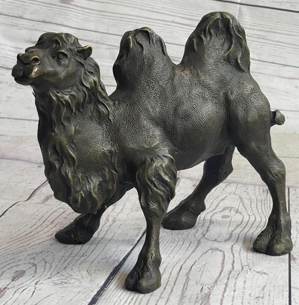 Camel Bronze Sculpture: Camel Bronze Sculpture We are thrilled to announce the release of this very handsome ?Standing Camel'. Capturing the most imperious of desert dwellers, this solid bronze casting is original artwork is
