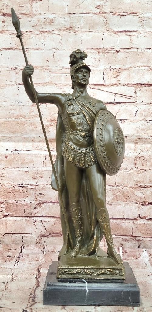 Roman Legionnaire with Javelin and Shield Bronze Sculpture by Drout - 18'' x 7'': Roman Legionnaire with Javelin and Shield Bronze Sculpture by Drout - 18" x 7" The Roman Legionnaire with Javelin and Shield by Drout is a commanding bronze sculpture that captures the disciplin
