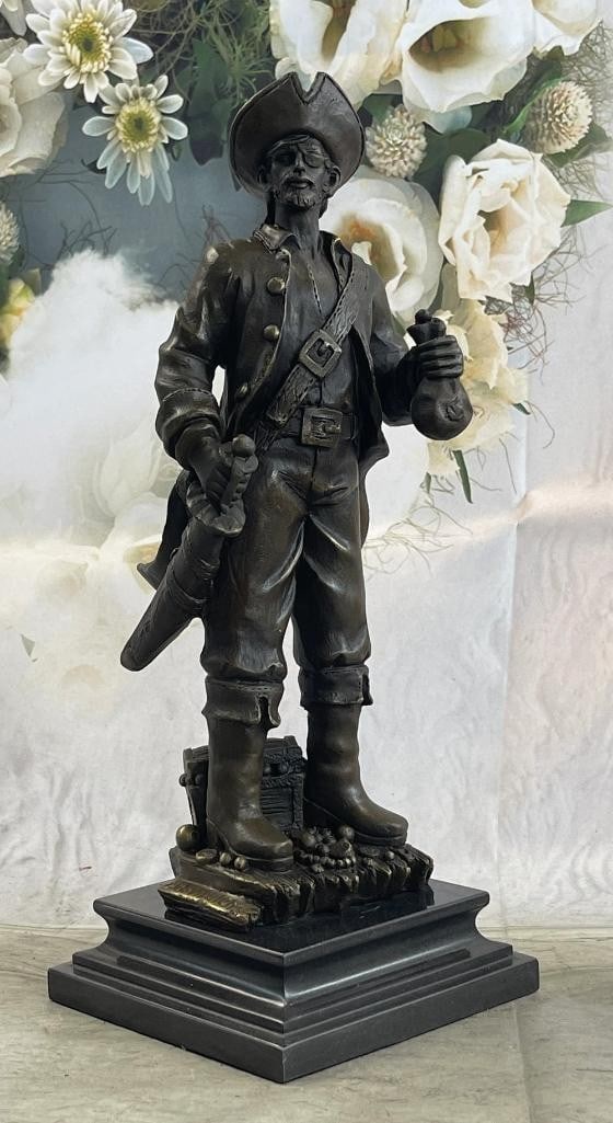 Pirate Standing Over Treasure Chest Original Bronze Statue - 14'' x 5'': Pirate Standing Over Treasure Chest Original Bronze Statue - 14" x 5" This bronze statue depicts a pirate standing over a treasure chest, exuding a sense of adventure and mystery. The pirate is 