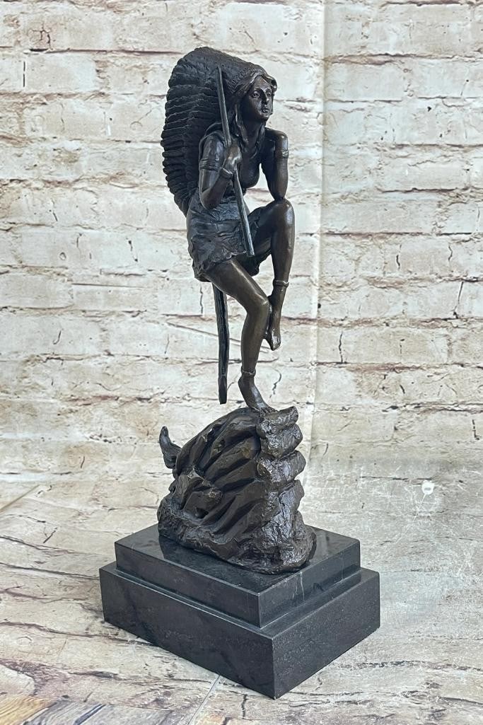 Shaman Performing Tribal Dance Inspired Bronze Statue - 15.5'' x 6'': Shaman Performing Tribal Dance Inspired Bronze Statue - 15.5" x 6" This stunning bronze sculpture captures the grace and spirit of a Native American woman dancing to tribal music. Poised on one 