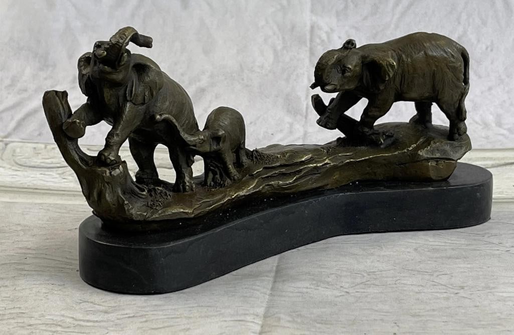 Three Walking Elephants Bronze Sculpture Inspired By Barye - 4'' x 8'': Three Walking Elephants Bronze Sculpture Inspired By Barye - 4" x 8" Some of the few members of an elephant clan can be imagined on the banks of a watering hole in the hot plains of Africa. Reac