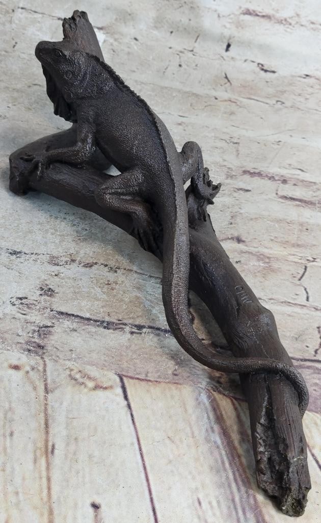Original Iguana On Tree Branch Bronze Sculpture - 4'' x 13'': Original Iguana On Tree Branch Bronze Sculpture - 4" x 13" This is an exquisitely representational sculpture of an iguana. It` s lifelike quality is impressive as the beholder can truly imagi