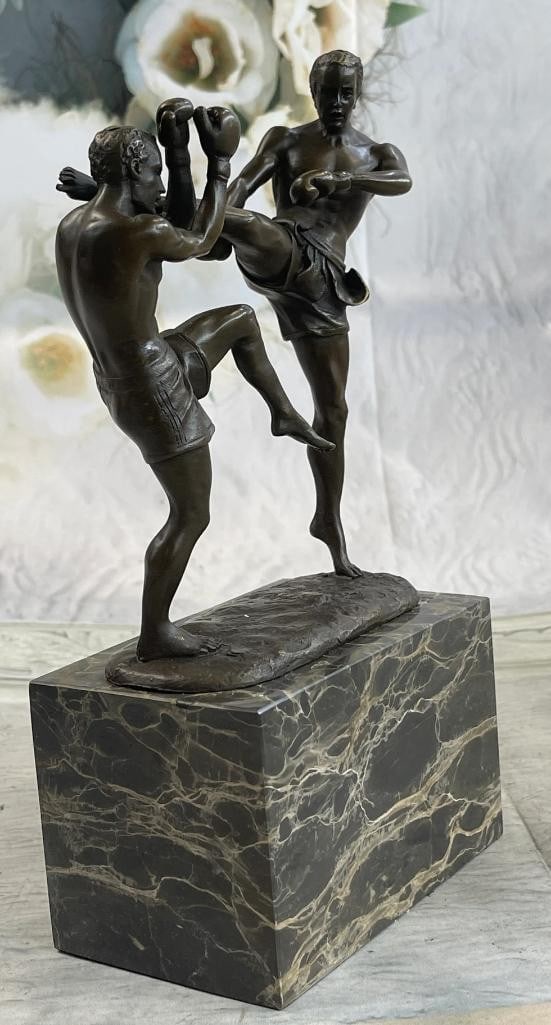Signed Milo Original Kick Boxers Bronze Sculpture On Marble Base - 10'' x 5'': Signed Milo Original Kick Boxers Bronze Sculpture On Marble Base - 10" x 5" Witness the intensity and determination captured in this remarkable bronze sculpture. In the final round of a fierce m