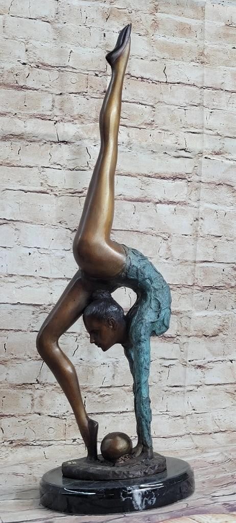 Acrobat Gymnast Bronze Sculpture: Acrobat Gymnast Bronze Sculpture This floor gymnast shows off her skills as she does a perfect back bend and gracefully extends her leg straight up and vertically. She shows an amazing skill of flexib