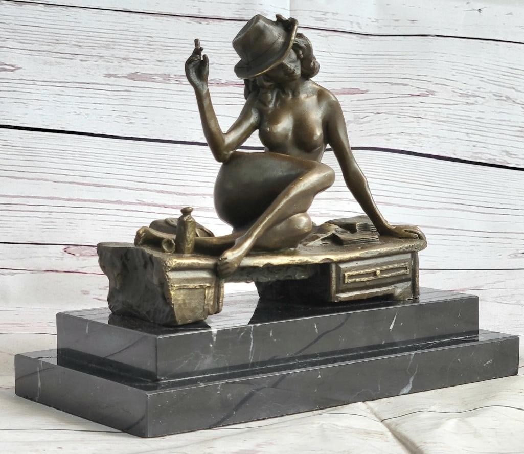 Art Deco Erotic Bronze Sculpture: Art Deco Erotic Bronze Sculpture With style, grace and ease she leans back while she is laying seductively on a bench, wearing her lover` s hat and holding a cigar while tilting her head in a