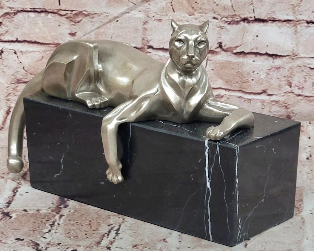 Modern Art Deco Panther Sculpture on Marble Base - 8" x 12": Modern Art Deco Panther Sculpture on Marble Base - 8" x 12" This original bronze sculpture presents a sleek and powerful panther in a refined Art Deco style, capturing the essence of speed, st