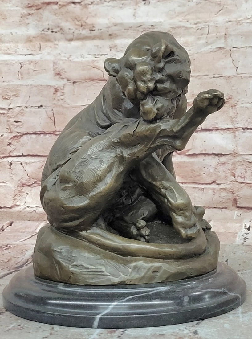 Wild Grace - Bronze Mountain Lion Wildlife Sculpture by Merculiano: Wild Grace - Bronze Mountain Lion Wildlife Sculpture by Merculiano Wild Grace is a stunning bronze sculpture that captures the quiet strength and natural elegance of a mountain lion in a moment of cal