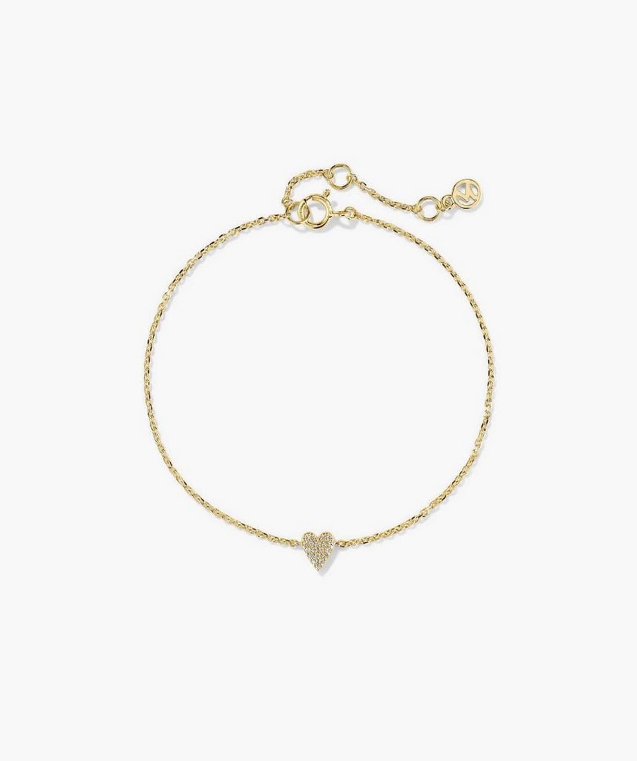 14k Yellow Gold Mini Diamond Pendant Necklace: 14k Yellow Gold Mini Diamond Pendant Necklace A delicate 14k yellow gold chain featuring a small diamond pendant for a subtle, refined look. Lightweight and versatile, it can be worn alone for simplic