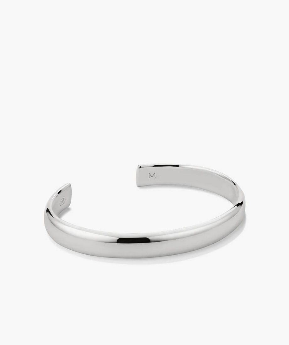 Sterling Silver Wide Cuff: Sterling Silver Wide Cuff A bold and modern cuff crafted in sterling silver. Its polished surface and substantial 8 mm width create a sleek, contemporary look that makes a statement on its own or laye