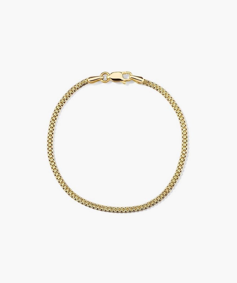 14k Yellow Gold Sleek Chain Bracelet: 14k Yellow Gold Sleek Chain Bracelet A sleek and timeless chain bracelet crafted in 14k yellow gold. Its polished, hollowed links provide a refined look that's perfect for everyday wear or layering