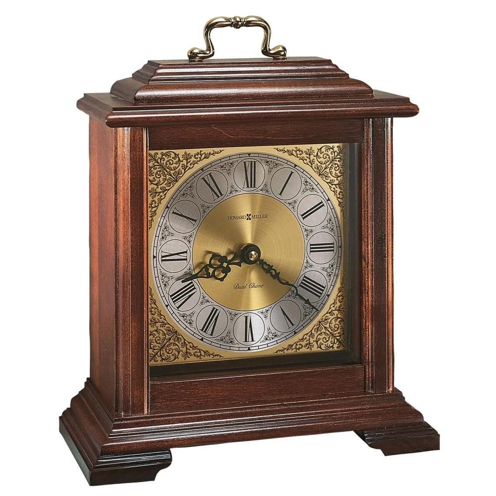 Classic Windsor Cherry Medford Mantel Clock by Howard Miller: Classic Windsor Cherry Medford Mantel Clock by Howard Miller The Medford Mantel Clock by Howard Miller adds a classic touch to any home with its Windsor cherry finish and select hardwood
