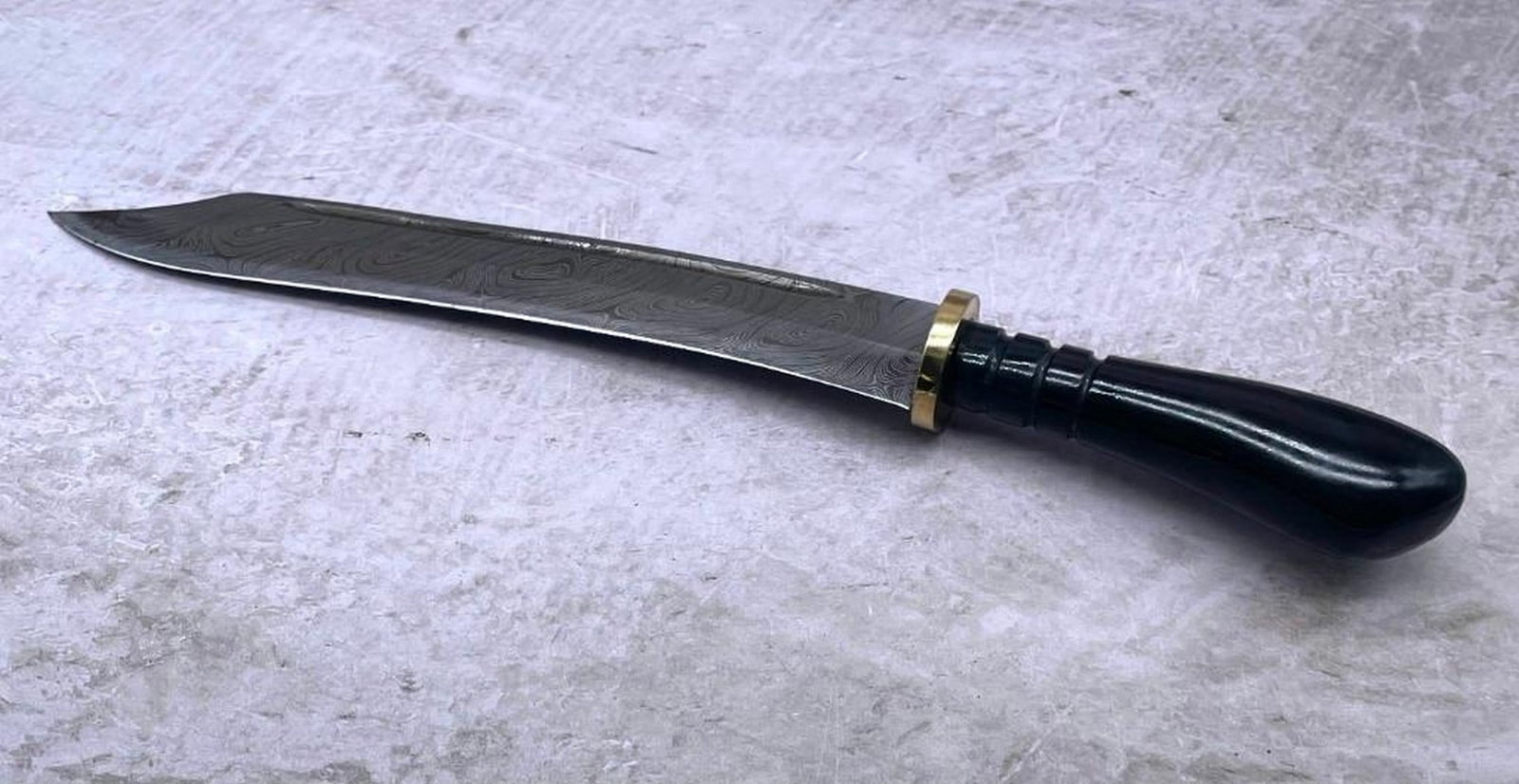 13 1/2" Ebonized Blade Handle Damascus Bowie Blade With Stitched Leather Sheath: 13 1/2" Ebonized Blade Handle Damascus Bowie Blade With Stitched Leather Sheath. An Excellent Hand Crafted Shive To Add To Any Collection. High Quality steel is utilized to forge the finest produc