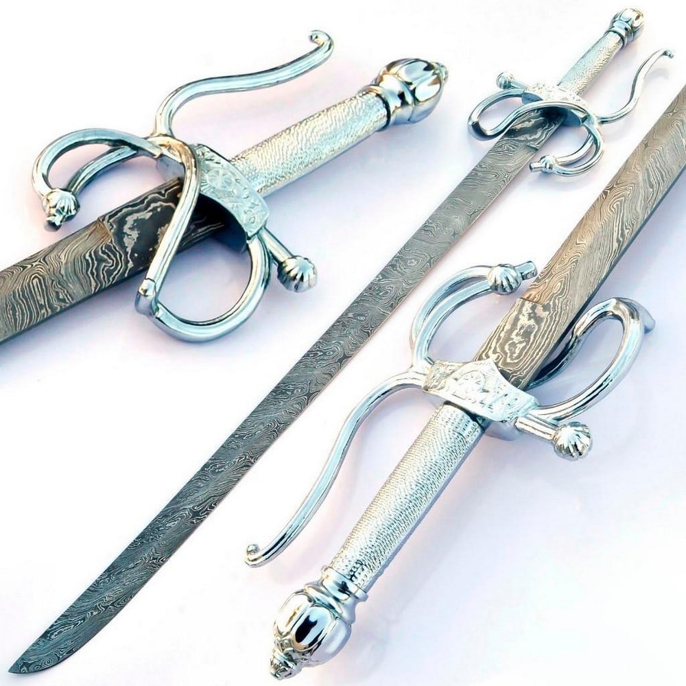 Hand Made Damascus Steel Layered Rapier With Silver: For Auction Is A Stunning Handmade Damascus Steel Rapier With A Stunning Silver Guarded Hilt. Each blade is created Using 256 Layers Of 1095 and 15N20 High Carbon Steels?????? To Produce A Superior