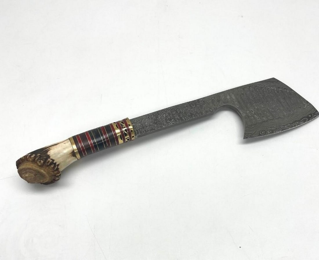 16" Damascus Axe Hand Carved Antler Hunters Handle: 16" Damascus Axe Hand Carved Antler Hunters Handle. Each blade is created Using 256 Layers Of 1095 and 15N20 High Carbon Steels?????? To Produce A Superior Edge And Maintain A High Tensile Strengt