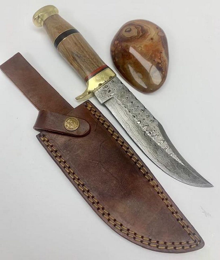 11" Inlaid Bone Handle Damascus Hunting Knife With Stitched Leather Sheath: 11" Inlaid Wood & Brass Handle Damascus Hunting Knife With Stitched Leather Sheath An Excellent Hand Crafted Shive To Add To Any Collection. High Quality steel is utilized to forge the finest